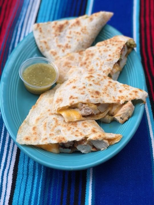 Cafe Coyote signature dishes Grande QuesadillaSuizas EnchiladasCoyote Burrito Plate